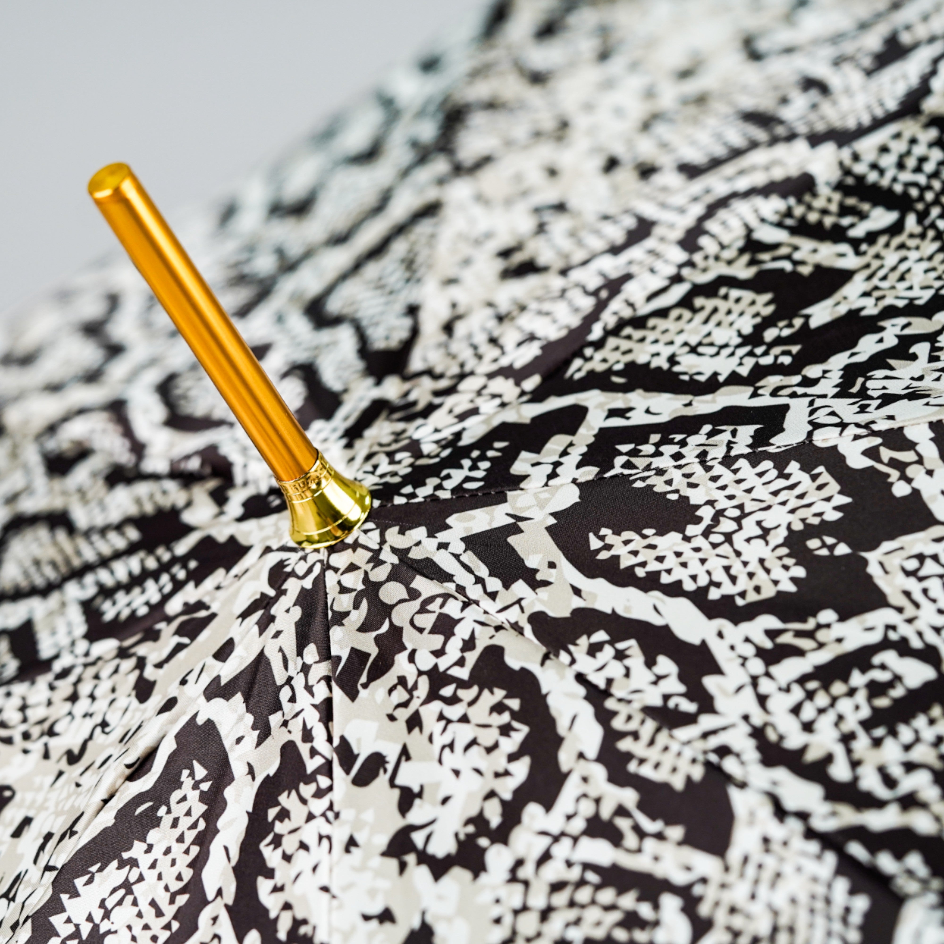 Elegance with a Bite – Handcrafted Python-Style Umbrella