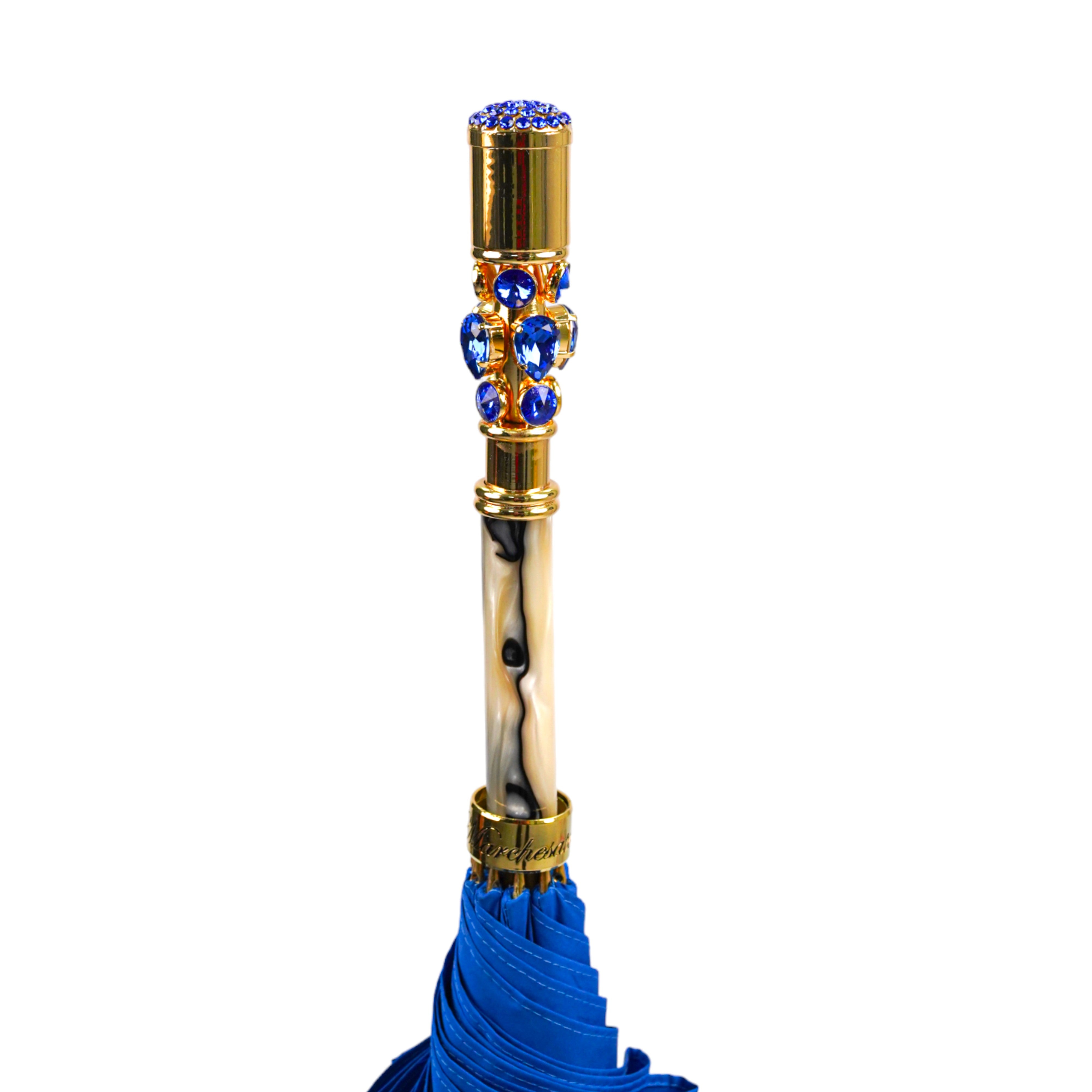 Esplendor de Zafiro: Paraguas hecho a mano en azul eléctrico con mango de cristal