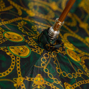 Savannah Majesty: Green Umbrella with Striking Leopard Handle
