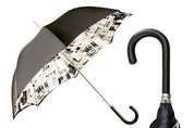 Read Between the Raindrops – The Newsprint Umbrella