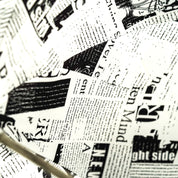 Read Between the Raindrops – The Newsprint Umbrella