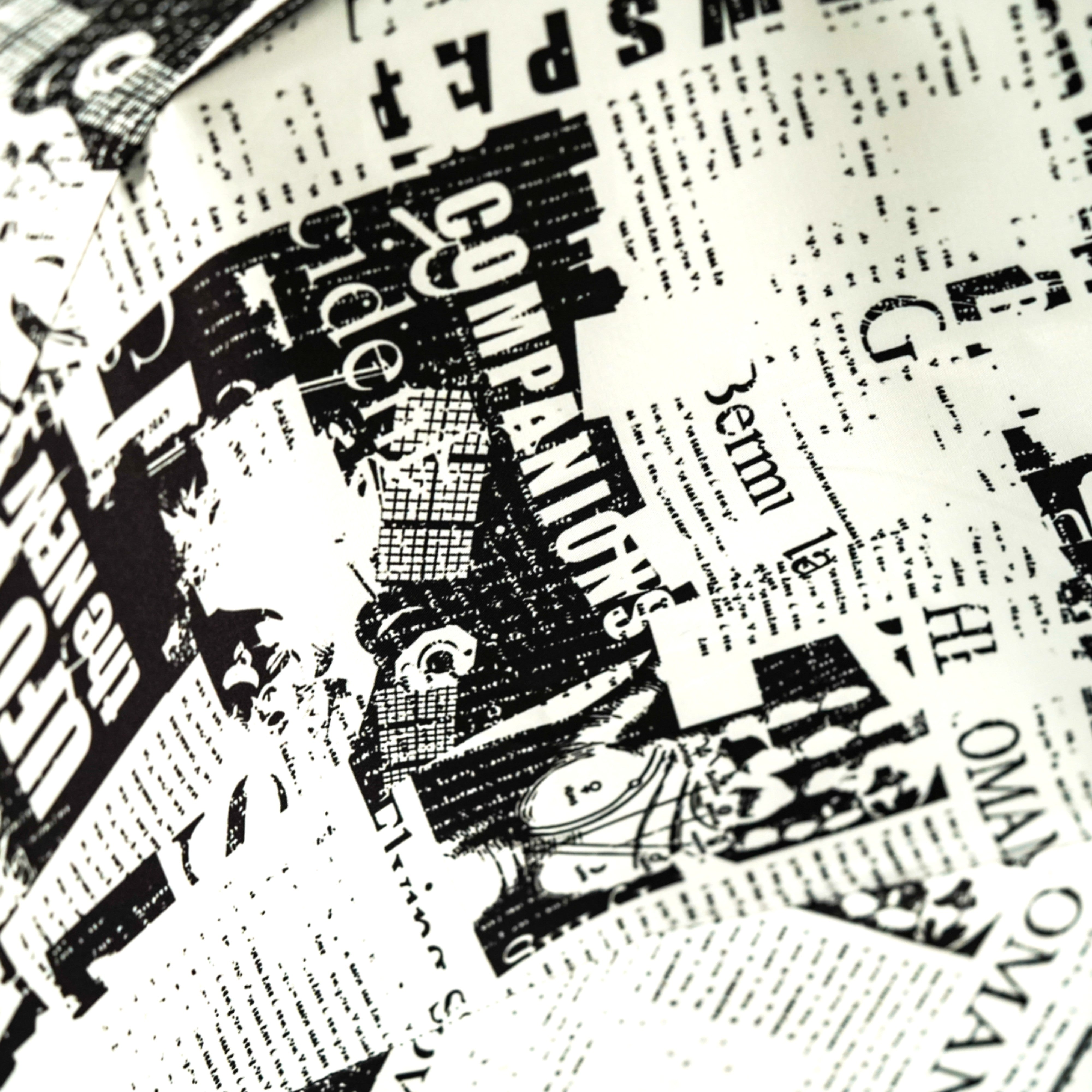 Read Between the Raindrops – The Newsprint Umbrella