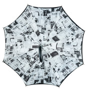 Read Between the Raindrops – The Newsprint Umbrella