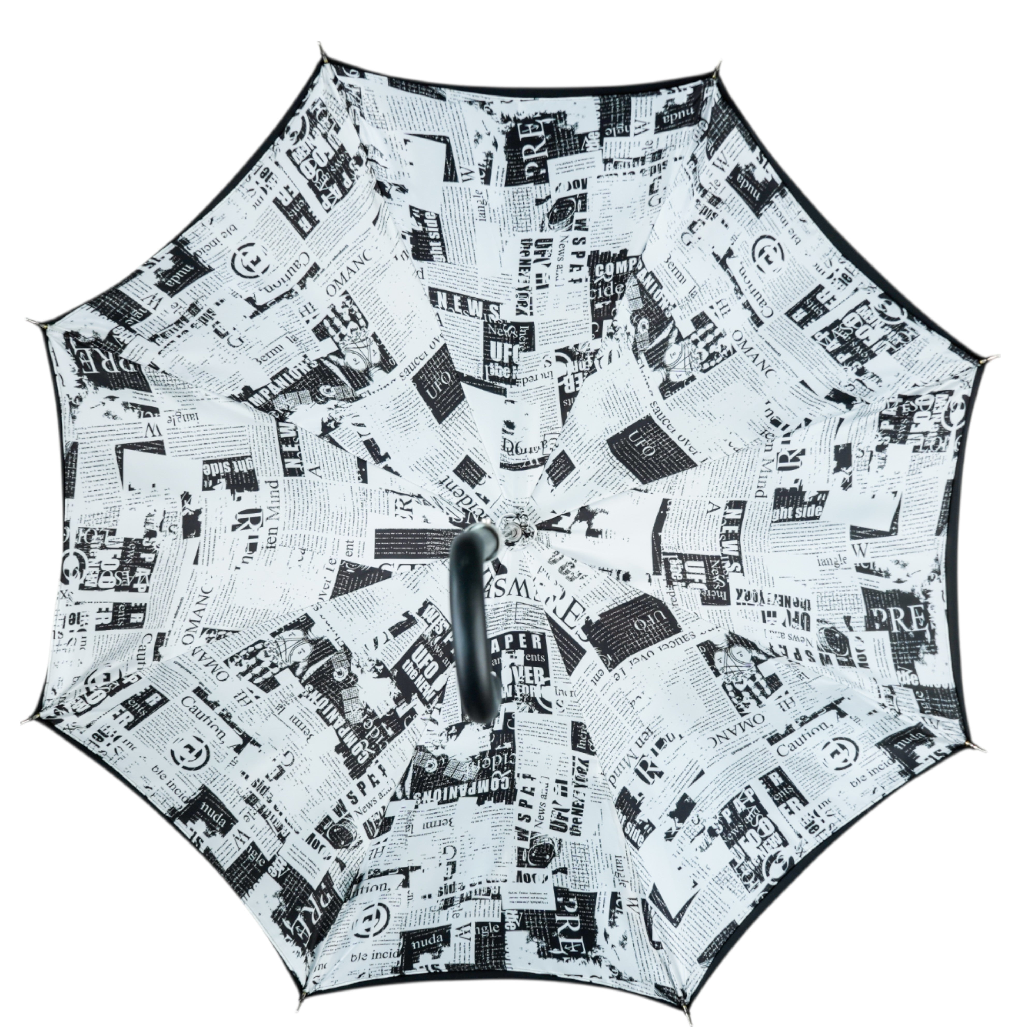 Read Between the Raindrops – The Newsprint Umbrella