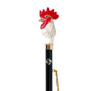 Ensueño de Gallo: Calzador chapado en oro de 24 quilates con mango de gallo pintado intrincadamente