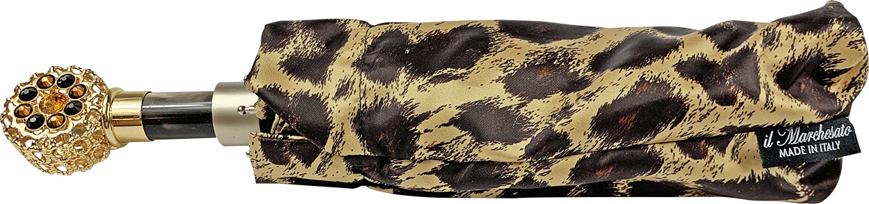 Elegante disegno leopardo con impugnatura filigrana