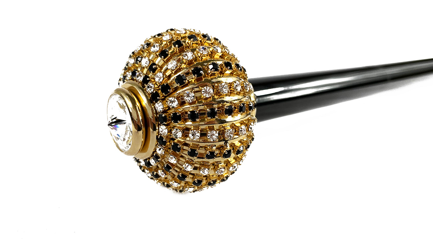 Walking stick with brass onion with black and white crystals