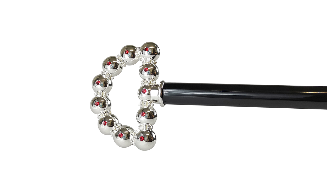 bright walking stick with spheres and crystals
